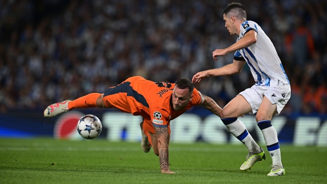 SAN SEBASTIAN, SPAIN - SEPTEMBER 20:  Marko Arnautovic of FC Internazionale competes for the ball with Robin Le Normand of Real Sociedad during the UEFA Champions League match between Real Sociedad and FC Internazionale  at Reale Arena on September 20, 2023 in San Sebastian, Spain. (Photo by Mattia Ozbot - Inter/Inter via Getty Images)