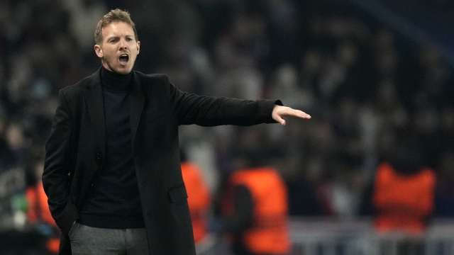 FILE - Then Bayern's head coach Julian Nagelsmann gives instructions to his players during the Champions League round of 16 first leg soccer match between Paris Saint Germain and Bayern Munich, at the Parc des Princes stadium, in Paris, France, Tuesday, Feb. 14, 2023. Germany has appointed former Bayern Munich coach Julian Nagelsmann to lead the men?s national soccer team. The German soccer federation says Nagelsmann is taking over on a short-term contract through the European Championship next summer. Germany is hosting the tournament. (AP Photo/Christophe Ena, File)