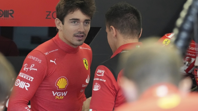 Ferrari driver Charles Leclerc of Monaco is in garage during the third practice ahead of the Japanese Formula One Grand Prix at the Suzuka Circuit, Suzuka, central Japan, Saturday, Sept. 23, 2023. (AP Photo/Toru Hanai)