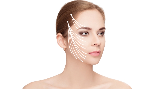Spa portrait of attractive woman with arrows on her face over white background. Face lifting concept. Plastic surgery treatment, medicine
