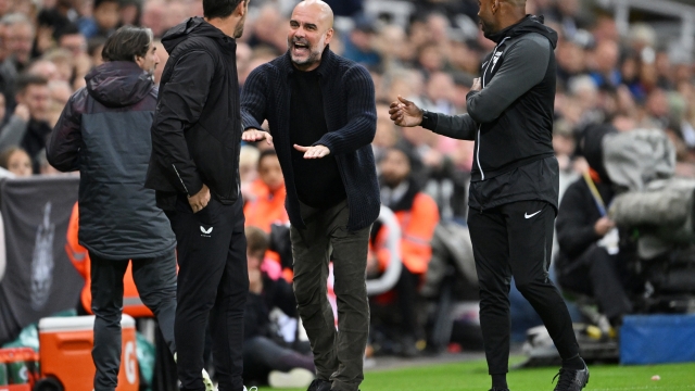 NEWCASTLE UPON TYNE, ENGLAND - SEPTEMBER 27: Pep Guardiola, Manager of Manchester City, argues with Assistant Manager of Newcastle United, Jason Tindall during the Carabao Cup Third Round match between Newcastle United and Manchester Cityat St James' Park on September 27, 2023 in Newcastle upon Tyne, England. (Photo by Stu Forster/Getty Images)