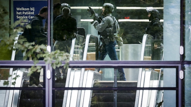 Dutch special intervention police officers secure the Erasmus University Medical Center (Erasmus MC) in Rotterdam on September 28, 2023, which was cordoned off after two reported shooting incidents. Three people were injured in two separate shootings in Rotterdam, according to Dutch police and local media, with the gunman arrested after holing up in a hospital. (Photo by Bas Czerwinski / ANP / AFP) / Netherlands OUT