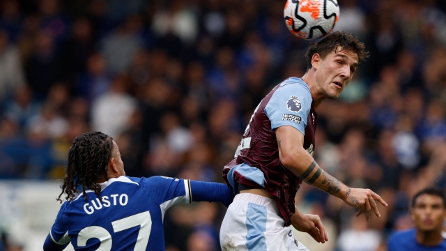Chelsea's French defender #27 Malo Gusto (L) vies with Aston Villa's Italian midfielder #22 Nicolo Zaniolo (R) during the English Premier League football match between Chelsea and Aston Villa at Stamford Bridge in London on September 24, 2023. (Photo by Ian Kington / AFP) / RESTRICTED TO EDITORIAL USE. No use with unauthorized audio, video, data, fixture lists, club/league logos or 'live' services. Online in-match use limited to 120 images. An additional 40 images may be used in extra time. No video emulation. Social media in-match use limited to 120 images. An additional 40 images may be used in extra time. No use in betting publications, games or single club/league/player publications. /