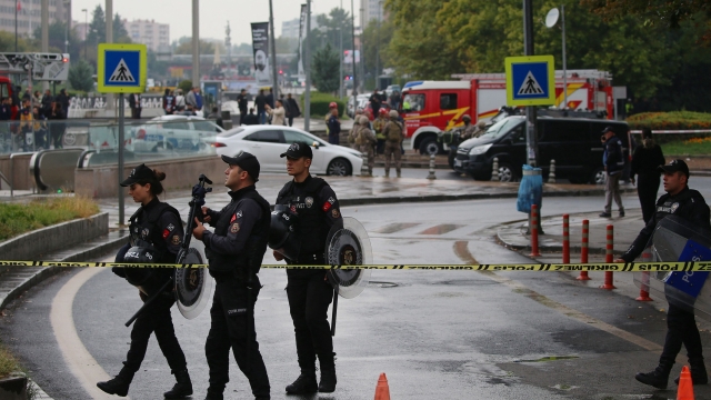 Members of Turkish Police Special Forces secure the area near the Interior Ministry following a bomb attack in Ankara, on October 1, 2023, leaving two police officers injured. The interior ministry said on October 1, 2023, that two attackers arrived in a commercial vehicle around 9:30 am (0630 GMT) "in front of the entrance gate of the General Directorate of Security of our Ministry of the Interior, and carried out a bomb attack." (Photo by Adem ALTAN / AFP)