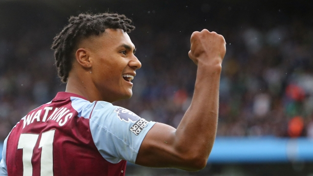 Aston Villa's English striker #11 Ollie Watkins (L) celebrates scoring his team's fourth goal during the English Premier League football match between Aston Villa and Brighton and Hove Albion at Villa Park in Birmingham, central England on September 30, 2023. (Photo by Geoff Caddick / AFP) / RESTRICTED TO EDITORIAL USE. No use with unauthorized audio, video, data, fixture lists, club/league logos or 'live' services. Online in-match use limited to 120 images. An additional 40 images may be used in extra time. No video emulation. Social media in-match use limited to 120 images. An additional 40 images may be used in extra time. No use in betting publications, games or single club/league/player publications. /