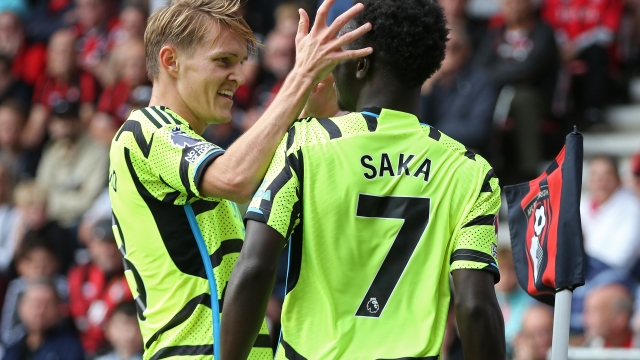BOURNEMOUTH, ENGLAND - SEPTEMBER 30: Bukayo Saka of Arsenal celebrates with teammate Martin Odegaard after scoring the team's first goal during the Premier League match between AFC Bournemouth and Arsenal FC at Vitality Stadium on September 30, 2023 in Bournemouth, England. (Photo by Steve Bardens/Getty Images)