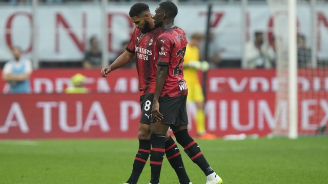 AC Milan's Ruben Loftus-Cheek, left, flanked by AC Milan's Fikayo Tomori, walks off the pitch during a Serie A soccer match between AC Milan and Lazio, at the San Siro stadium in Milan, Italy, Saturday, Sept. 30, 2023. (AP Photo/Luca Bruno)