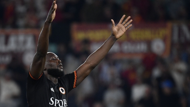 Roma's Belgian forward #90 Romelu Lukaku celebrates scoring his team's first goal during the Italian Serie A football match between AS Roma and Frosinone Calcio at the Olympic Stadium in Rome on October 1, 2023. (Photo by Filippo MONTEFORTE / AFP)