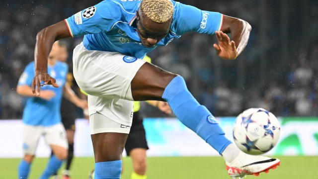 Napoli's Nigerian forward #09 Victor Osimhen kicks the ball during the UEFA Champions League 1st round day 2 Group C football match Napoli vs Real Madrid at the Diego Armando Maradona stadium in Naples on October 3, 2023. (Photo by Alberto PIZZOLI / AFP)