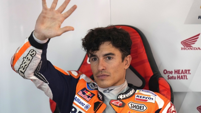 Spanish rider Marc Marquez waves to the spectators after the MotoGP qualification session for Sunday's Japanese Motorcycle Grand Prix at the Twin Ring Motegi circuit in Motegi, north of Tokyo Saturday Sept. 30, 2023. (AP Photo/Shuji Kajiyama)