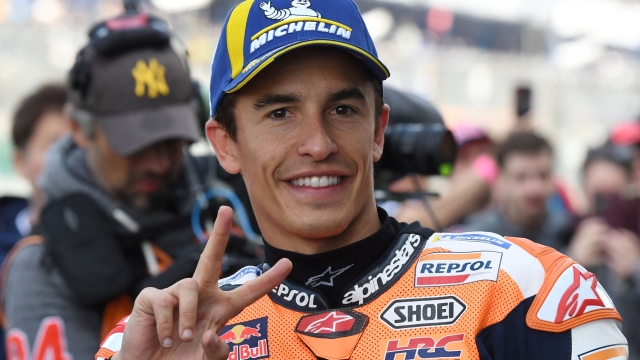 Repsol Honda Team's Spanish rider Marc Marquez celebrates after he finished second in the qualifying rounds ahead of the French Moto GP Grand Prix, at the Bugatti circuit in Le Mans, northwestern France, on May 13, 2023. (Photo by Jean-Francois MONIER / AFP)