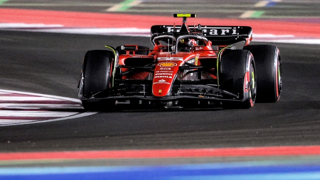 Ferrari's Spanish driver Carlos Sainz Jr drives during the qualifying session ahead of the Qatari Formula One Grand Prix at the Lusail International Circuit on October 6, 2023. (Photo by KARIM JAAFAR / AFP)
