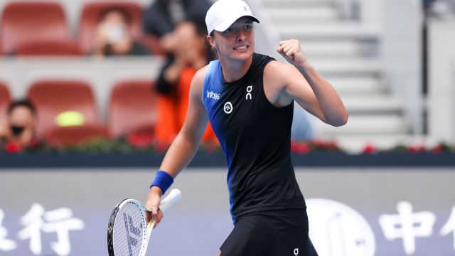 BEIJING, CHINA - OCTOBER 07:Iga Swiatek of Poland celebrates after winning during the Women's Singles semifinal match against Coco Gauff of the United States during day 12 of the 2023 China Open at National Tennis Center on October 7, 2023 in Beijing, China. (Photo by Yanshan Zhang/Getty Images)