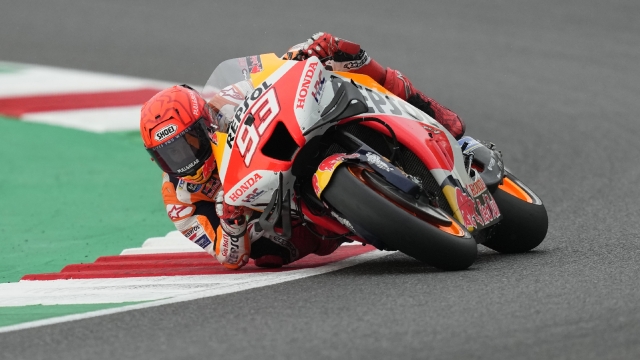 FILE - Spain's Marc Marquez rides his Honda during the qualifying session for the MotoGP Grand Prix of Italy at the Mugello circuit in Scarperia, Italy, Saturday, May 28, 2022. Honda?s MotoGP team says that former world champion Marc Márquez will be leaving the team at the end of the season. That will conclude a highly successful 11-year-stint during which the Spaniards won six MotoGP championships. (AP Photo/Antonio Calanni, File)