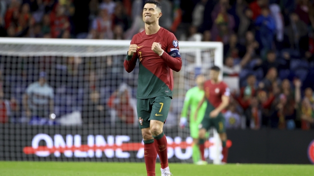 Portugal's Cristiano Ronaldo celebrates at the end of the Euro 2024 group J qualifying soccer match between Portugal and Slovakia at the Dragao stadium in Porto, Portugal, Friday, Oct. 13, 2023. Portugal won 3-2 to qualify for the Euro 2024 championship in Germany. (AP Photo/Luis Vieira)