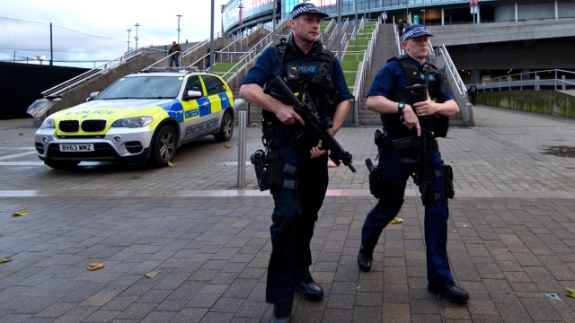 LONDON, ENGLAND - NOVEMBER 17:  Armed police officers stand guard outside Wembley Stadium ahead of tonight's football match between England and France on November 17, 2015 in London, England. Security in London has tightened after a series of terror attacks across the French capital of Paris on Friday left at least 129 people dead and hundreds more injured.  (Photo by Ben Pruchnie/Getty Images)