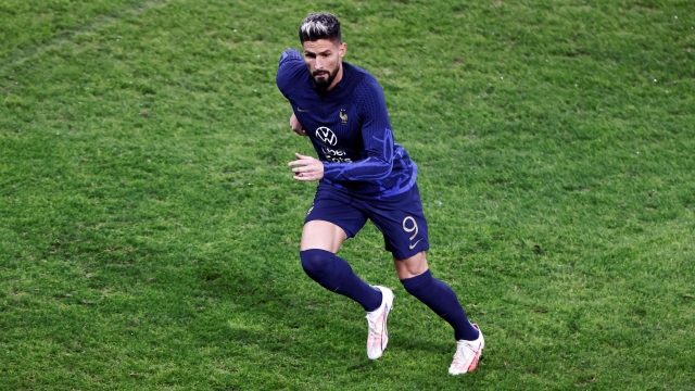 France's forward #09 Olivier Giroud warms up ahead of the friendly football match between France and Scotland at Pierre-Mauroy stadium, in Villeneuve-D'Ascq, northern France, on October 17, 2023. (Photo by Sameer Al-Doumy / AFP)