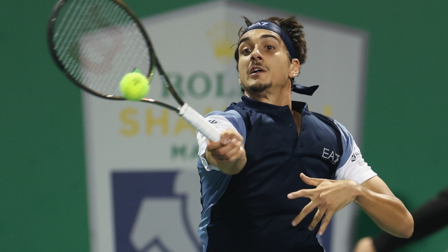 SHANGHAI, CHINA - OCTOBER 09: Lorenzo Sonego of Italy returns a shot in the Men's Singles Round of 32 match against Nicolas Jarry of Chile on Day 8 of the 2023 Shanghai Rolex Masters at Qi Zhong Tennis Centre on October 9, 2023 in Shanghai, China. (Photo by Lintao Zhang/Getty Images)
