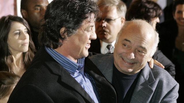 FILE - Sylvester Stallone, left, star of the movie "Rocky Balboa," and cast member Burt Young attend the film's premiere in Philadelphia, Dec. 18, 2006. Burt Young, the Oscar-nominated actor who played Paulie, the rough-hewn, mumbling-and-grumbling best friend, corner-man and brother-in-law to Sylvester Stallone in the ?Rocky? franchise, has died. Young died Oct. 8, 2023 in Los Angeles. (AP Photo/Matt Rourke, File)