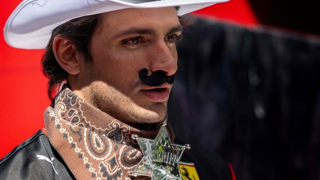 Ferrari's Spanish driver Carlos Sainz Jr. is dressed as a sheriff in the paddock ahead of the United States Formula One Grand Prix at the Circuit of the Americas in Austin, Texas, on October 19, 2023. (Photo by Jim WATSON / AFP)