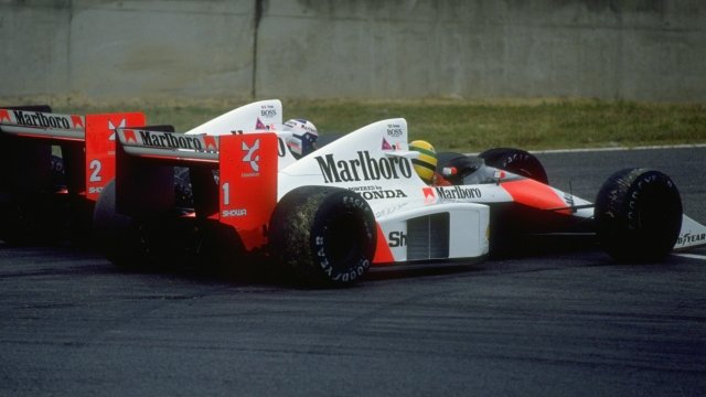 1989:  Alain Prost of France and Ayrton Senna of Brazil collide in their McLaren Hondas during the Japanese Grand Prix at the Suzuka circuit in Japan. Prost retired after the collision and Senna was disqualified for having a push start.  \ Mandatory Credit: Pascal  Rondeau/Allsport