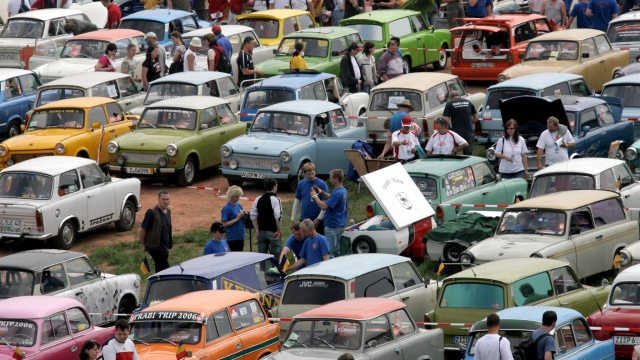 epa00744979 A lot of 'Trabis' are parked in Zwickau, Germany, Saturday, 17 June 2006. The Trabant car was the main car driven in the former eastern German state (GDR). Up to 2,000 vehicels are expected at the 13th International Trabi meeting.  EPA/Jan-Peter Kasper