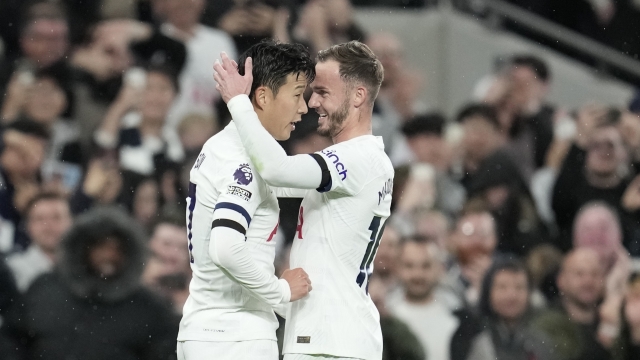 Tottenham's Son Heung-min, left, and Tottenham's James Maddison during the English Premier League soccer match between Tottenham Hotspur and Fulham at the Tottenham Hotspur Stadium in London, Monday, Oct. 23, 2023. (AP Photo/Kin Cheung)