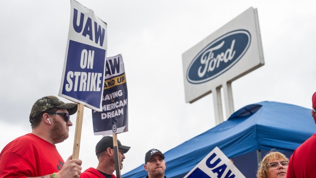 (FILES) (FILES) Members of the United Auto Workers (UAW) pickett outside of the Michigan Parts Assembly Plant in Wayne, Michigan, on September 26, 2023. An auto workers strike in the United States expanded October 11, 2023 with 8,700 more employees walking off their jobs, said the United Automobile Workers (UAW) union, as a deal with major automakers remained elusive. (Photo by Matthew Hatcher / AFP)
