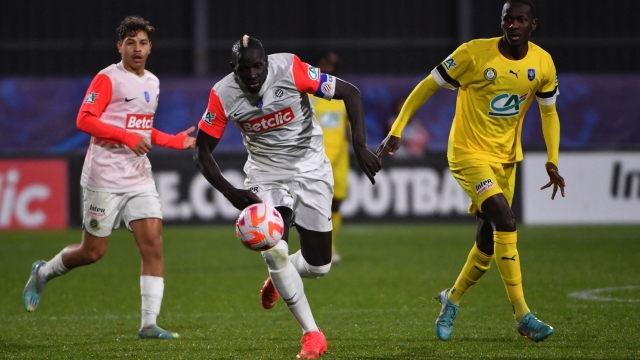Montpellier's French defender Mamadou Sakho runs with the ball during the French cup round of 64 football match between Pau Football Club and MHSC Montpellier at the Nouste Camp Stadium in Pau, southwestern France, on January 6, 2023. (Photo by GAIZKA IROZ / AFP)