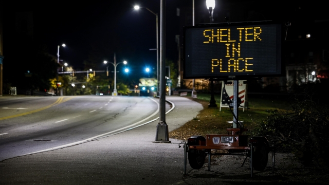 epa10939766 A road sign reads 'Shelter in Place' after a man reportedly opened fire killing and injuring numerous people in downtown Lewiston, Maine, USA, 25 October 2023. Early reports indicate as many as 20 people have been killed, and dozens injured. Police are still searching for the suspect.  EPA/CJ GUNTHER