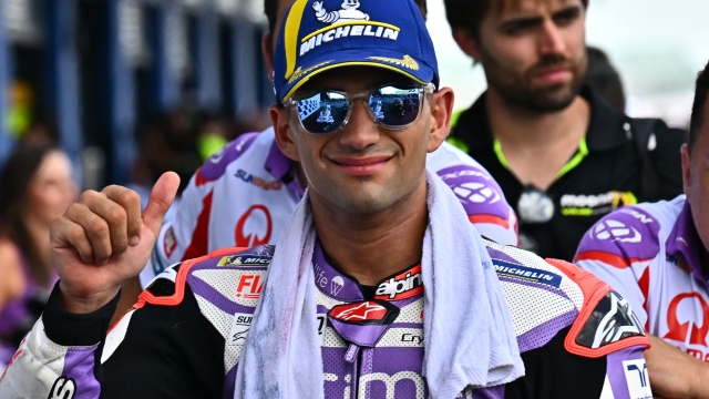 Prima Pramac's Spanish rider Jorge Martin reacts after securing the pole position in the qualifying session of the MotoGP Thailand Grand Prix at the Buriram International Circuit in Buriram on October 28, 2023. (Photo by Lillian SUWANRUMPHA / AFP)