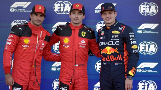(L t R) Ferrari's Spanish driver Carlos Sainz Jr., Ferrari's Monegasque driver Charles Leclerc, and Red Bull Racing's Dutch driver Max Verstappen pose after the qualifying session session for the Formula One Mexico Grand Prix at the Hermanos Rodriguez racetrack in Mexico City on October 28, 2023. Leclerc will start on pole position with Sainz Jr. second and Verstappen thrid. (Photo by ALFREDO ESTRELLA / AFP)