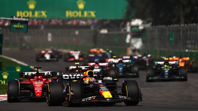 MEXICO CITY, MEXICO - OCTOBER 29: Max Verstappen of the Netherlands driving the (1) Oracle Red Bull Racing RB19 leads Charles Leclerc of Monaco driving the (16) Ferrari SF-23 and the rest of the field at the start of the race during the F1 Grand Prix of Mexico at Autodromo Hermanos Rodriguez on October 29, 2023 in Mexico City, Mexico. (Photo by Jared C. Tilton/Getty Images)