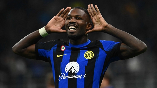 Inter Milan's French forward #09 Marcus Thuram celebrates after scoring the team's first goal during the Italian Serie A football match between Inter Milan and AS Roma at San Siro Stadium, in Milan on October 29, 2023. (Photo by Isabella BONOTTO / AFP)