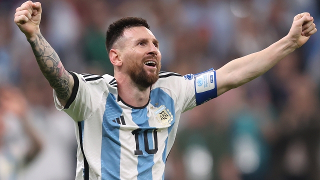 LUSAIL CITY, QATAR - DECEMBER 18: Lionel Messi of Argentina celebrates scoring their team's third goal past Hugo Lloris of France during the FIFA World Cup Qatar 2022 Final match between Argentina and France at Lusail Stadium on December 18, 2022 in Lusail City, Qatar. (Photo by Julian Finney/Getty Images)