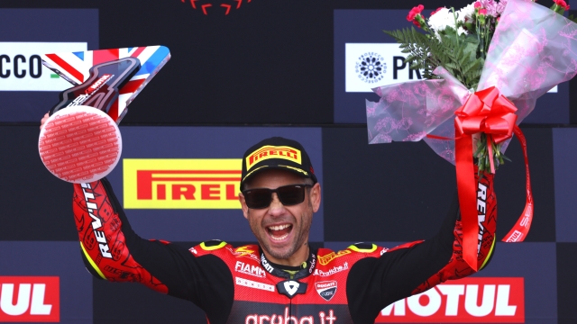 DONNINGTON, ENGLAND - JULY 02: Alvaro Bautista of Spain and Team Aruba.it Racing celebrates with the trophy after winning The WorldSBK Race 2 in the 2023 MOTUL FIM Superbike World Championships at Donnington Park on July 01, 2023 in Donnington, England. (Photo by Alex Pantling/Getty Images)