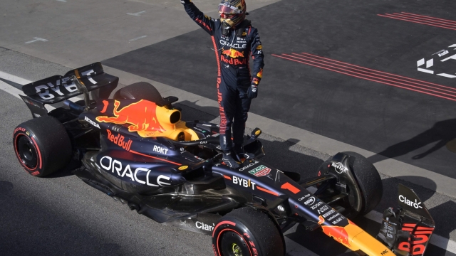 Red Bull Racing's Dutch driver Max Verstappen celebrates after winning the Formula One Brazil Grand Prix at the Autodromo Jose Carlos Pace racetrack, also known as Interlagos, in Sao Paulo, Brazil, on November 5, 2023. (Photo by NELSON ALMEIDA / AFP)