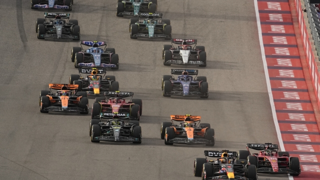 Red Bull driver Max Verstappen, front, of the Netherlands, leads the field at the start of the sprint ahead of the Formula One U.S. Grand Prix auto race at Circuit of the Americas, Saturday, Oct. 21, 2023, in Austin, Texas. (AP Photo/Eric Gay)