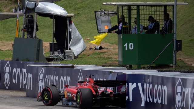 Ferrari's Monegasque driver Charles Leclerc ends up in the barriers after crashing at the start of the Formula One Brazil Grand Prix at the Autodromo Jose Carlos Pace racetrack, also known as Interlagos, in Sao Paulo, Brazil, on November 5, 2023. (Photo by DOUGLAS MAGNO / AFP)
