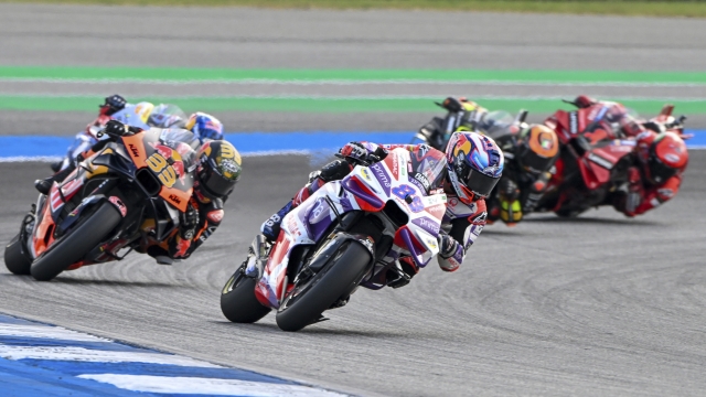 Spain's Jorge Martin is chased by the pack of rider during the MotoGP at the Chang International Circuit in Buriram, Thailand, Sunday, Oct. 29, 2023. (AP Photo/ Kittinun Rodsupan)