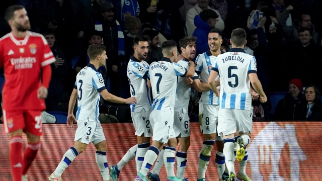 Real Sociedad's Spanish midfielder #08 Mikel Merino celebrates scoring his team's first goal during the UEFA Champions League group D football match between Real Sociedad and SL Benfica at the Reale Arena stadium in San Sebastian on November 8, 2023. (Photo by CESAR MANSO / AFP)