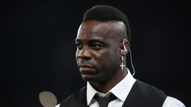 Former Italy forward Mario Balotelli watches the celebrations after the UEFA Champions League final football match between Inter Milan and Manchester City at the Ataturk Olympic Stadium in Istanbul, on June 10, 2023. (Photo by FRANCK FIFE / AFP)