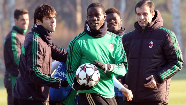 From left to right: Ricardo Kaka', Mario Balotelli and Massimiliano Allegri during a training session on the eve of the group H Champion's League football match AC Milan vs Ajax, on December 10, 2013 in their training center of Milanello in Carnago. ANSA / MATTEO BAZZI