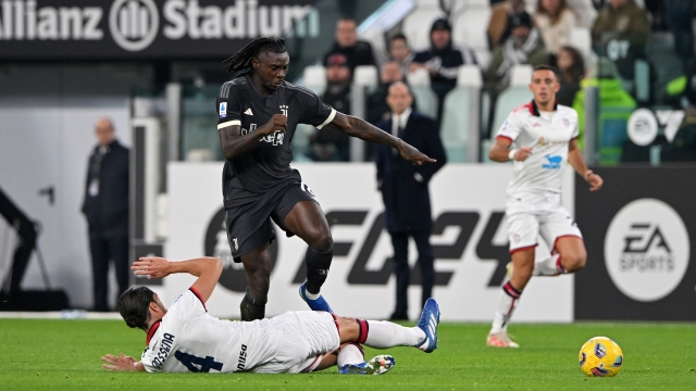 TURIN, ITALY - NOVEMBER 11: Moise Kean of Juventus is challenged by Alberto Dossena of Cagliari during the Serie A TIM match between Juventus and Cagliari Calcio at Allianz Stadium on November 11, 2023 in Turin, Italy. (Photo by Chris Ricco - Juventus FC/Juventus FC via Getty Images)