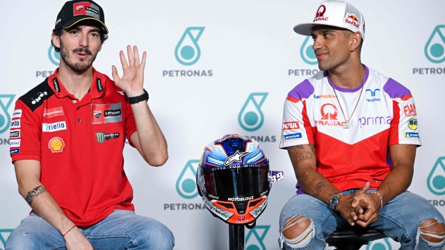 Ducati Lenovo Team's Italian rider Francesco Bagnaia (L) and Prima Pramac's Spanish rider Jorge Martin (R) attend a press conference at the Sepang International Circuit in Sepang on November 9, 2023, ahead of the practice sessions for the MotoGP Malaysia Grand Prix. (Photo by Mohd RASFAN / AFP)