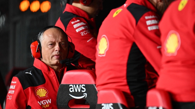 Ferrari's French team principal Frederic Vasseur listens to his technical team after Ferrari's Spanish driver Carlos Sainz Jr., suffered an accident during the first practice session for the Las Vegas Formula One Grand Prix on November 16, 2023, in Las Vegas, Nevada. Race stewards cancelled the practice after the accident to inspect the track. (Photo by ANGELA WEISS / AFP)