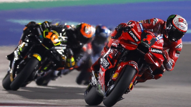 Ducati Lenovo Team's Italian rider Francesco Bagnaia competes during the Moto GP Grand Prix of Qatar at the Lusail International Circuit, in the city of Lusail on November 19, 2023. (Photo by KARIM JAAFAR / AFP)