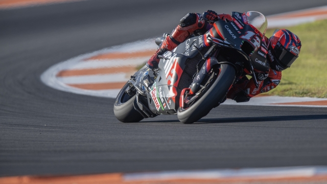 VALENCIA, SPAIN - NOVEMBER 24: Maverick Vinales of Spain and Aprilia Racing rounds the bend during the MotoGP of Valencia - Practice at Ricardo Tormo Circuit on November 24, 2023 in Valencia, Spain. (Photo by Mirco Lazzari gp/Getty Images)