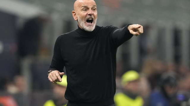 AC Milan's manager Stefano Pioli gestures from the touchline during the Champions League group F soccer match between AC Milan and Paris Saint Germain at the San Siro stadium in Milan, Italy, Tuesday, Nov. 7, 2023. (AP Photo/Antonio Calanni)