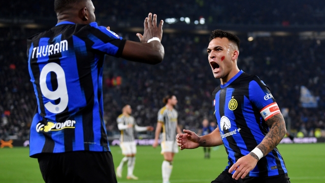 TURIN, ITALY - NOVEMBER 26: Lautaro Martinez of FC Internazionale celebrates with Marcus Thuram of FC Internazionale after scoring the team's first goal during the Serie A TIM match between Juventus and FC Internazionale at  on November 26, 2023 in Turin, Italy. (Photo by Valerio Pennicino/Getty Images)